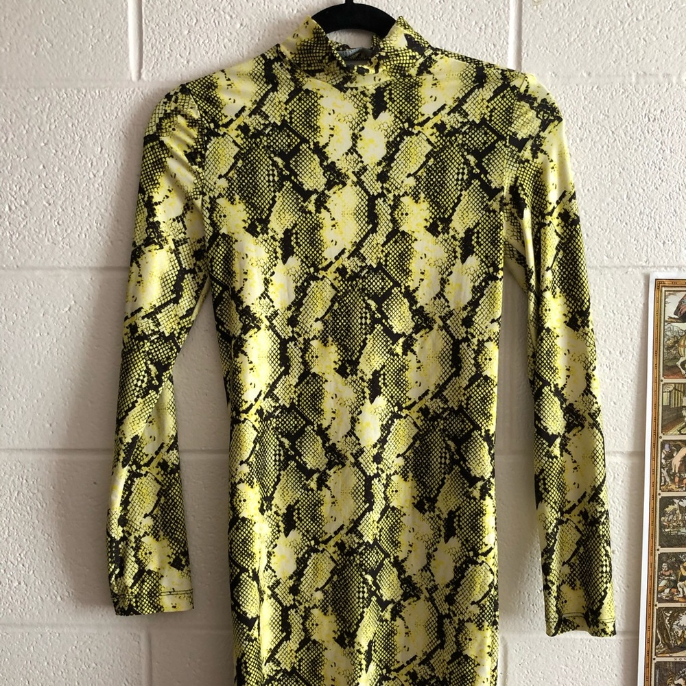 Tight bodycon snakeskin mini dress